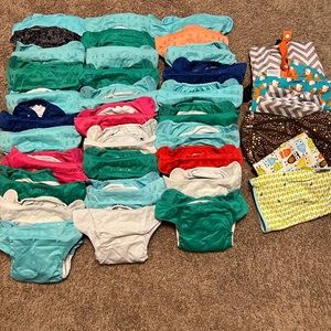 31 Bumgenius all in one diapers and five wet bags
